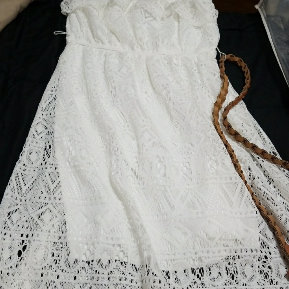 Whitw high low dress.